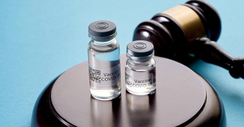 covid vaccine and judge's gavel