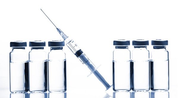 glass medicine vials with syringe